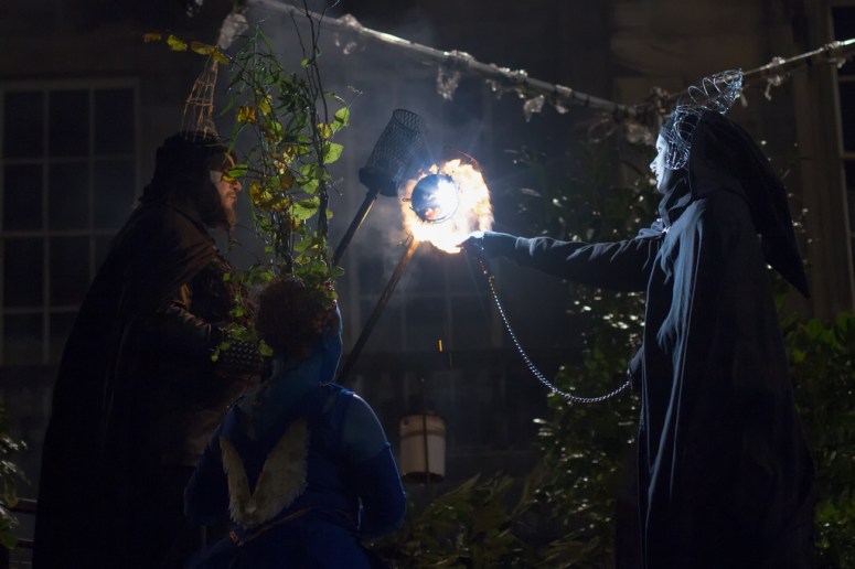 Torchbearers light the Neid Fire at Samhuinn 2013. Photo by Stephen Yu.